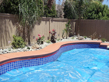 Custom Ashlar Slate stamped concrete pool deck with cool deck finish in Folsom, CA