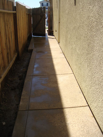 Close up of a slip resistant salt rock finish concrete pool deck in Elk Grove, CA