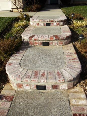 Custom poured concrete steps with Ashlar Slate stamped finish in Elk Grove, CA